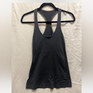 Super cute grey lululemon tank. Rainbow trim.